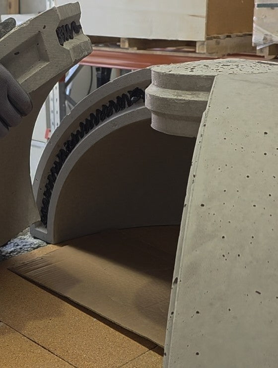 Refractory dome section being assembled in the Pizza Oven Club wood-fired pizza oven kit.